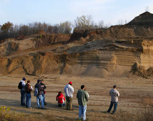 photo of students working at an outcrop